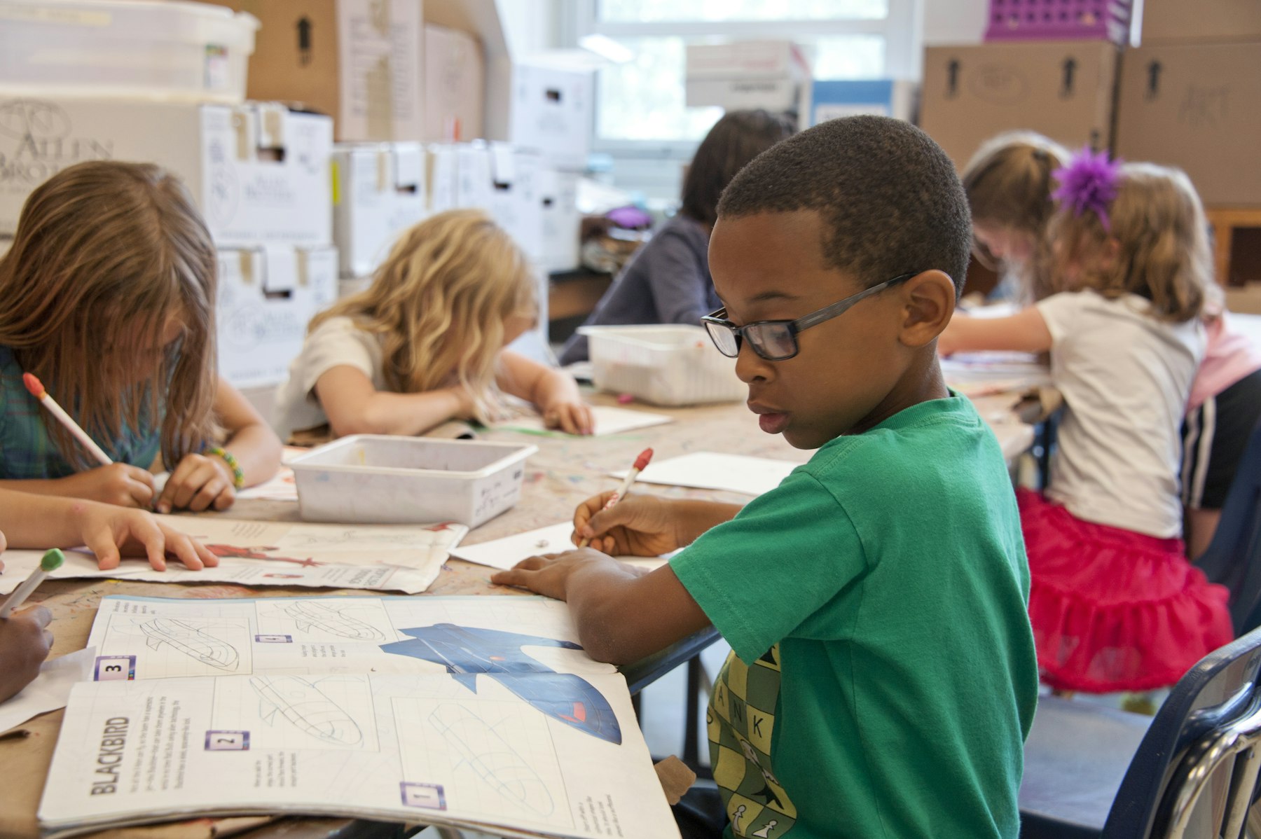 A child working on a puzzle