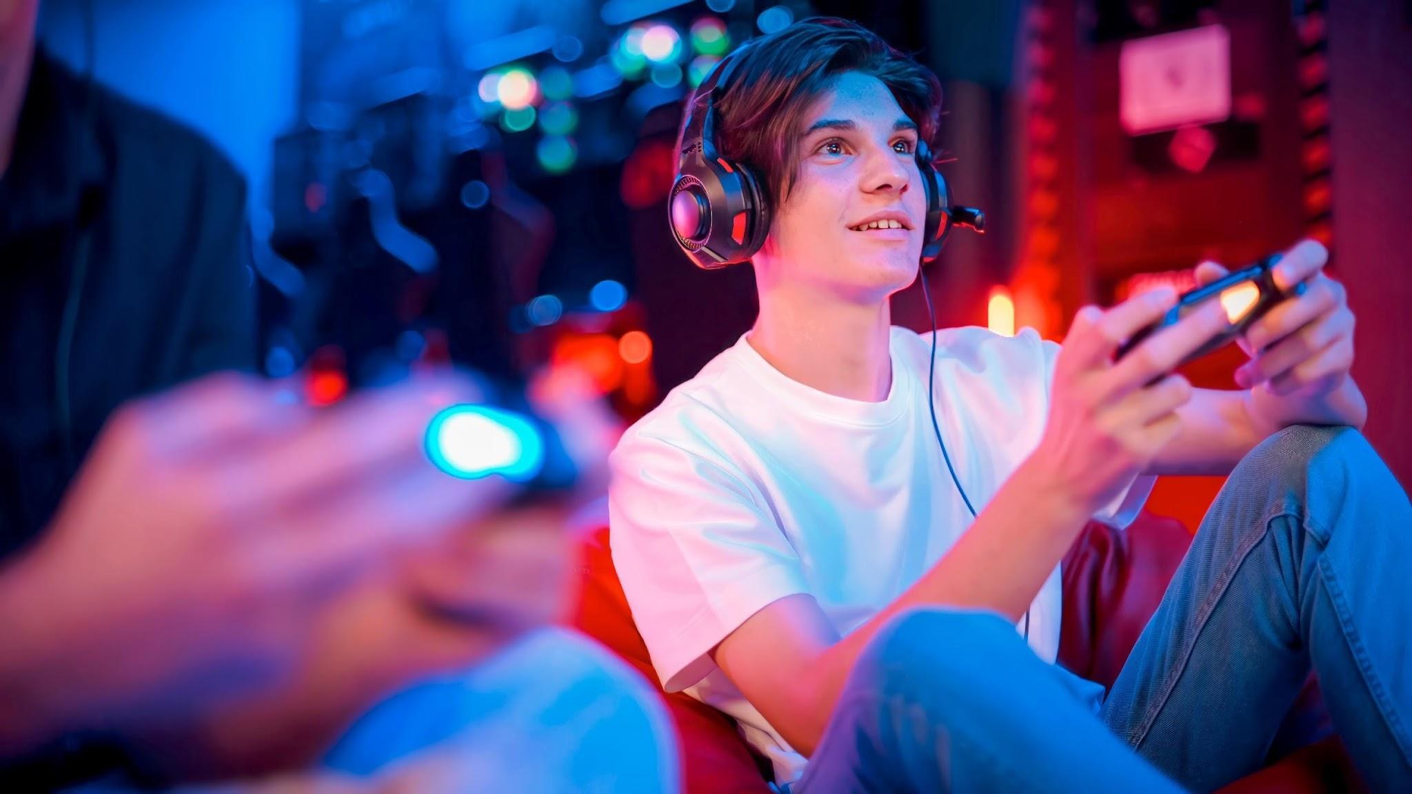 A gamer with a headset, mid-session